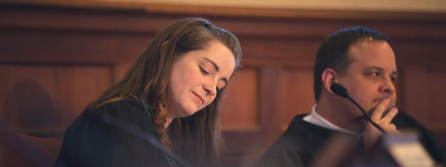 Judges at a moot court: Pursue the MA in Law - Human Rights degree at Regent University.
