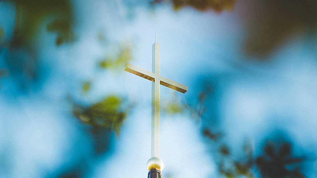 The Cross on Regent's chapel steeple: Pursue a Certificate of Graduate Studies: Divinity/Theology at Regent University, online or in VA.