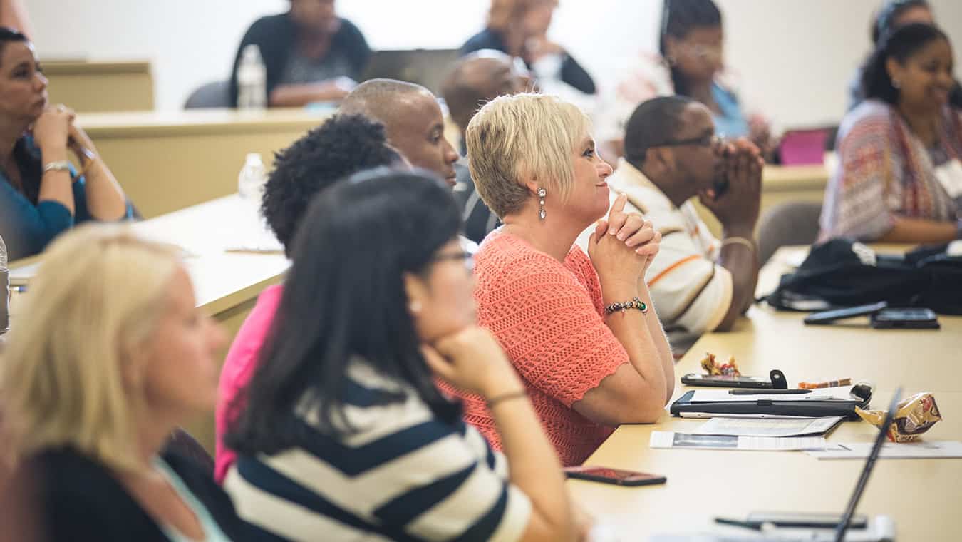 Students in a classroom: Pursue a Ph.D. in Education – Christian Education Leadership at Regent University.