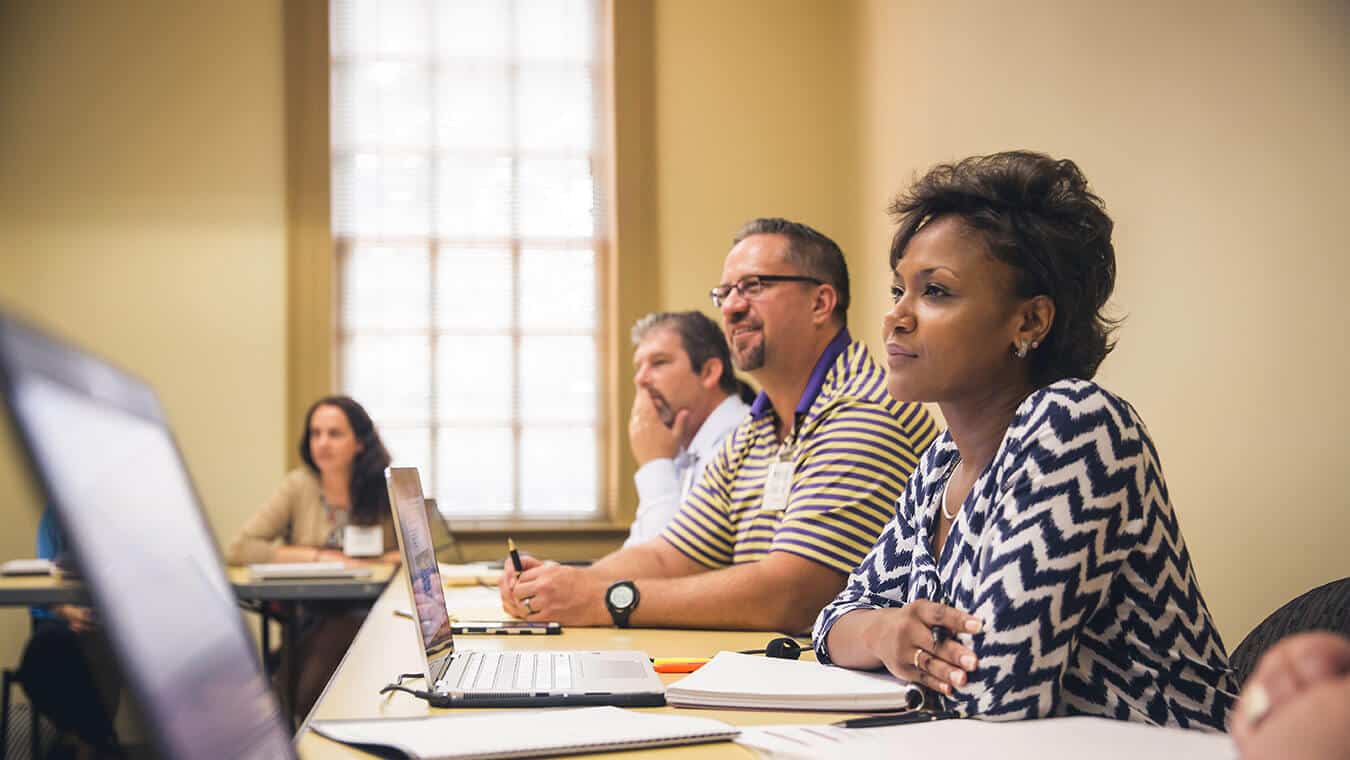 Students in a class: Pursue an Ed.S. in Educational Leadership – Christian Education Leadership degree at Regent University.