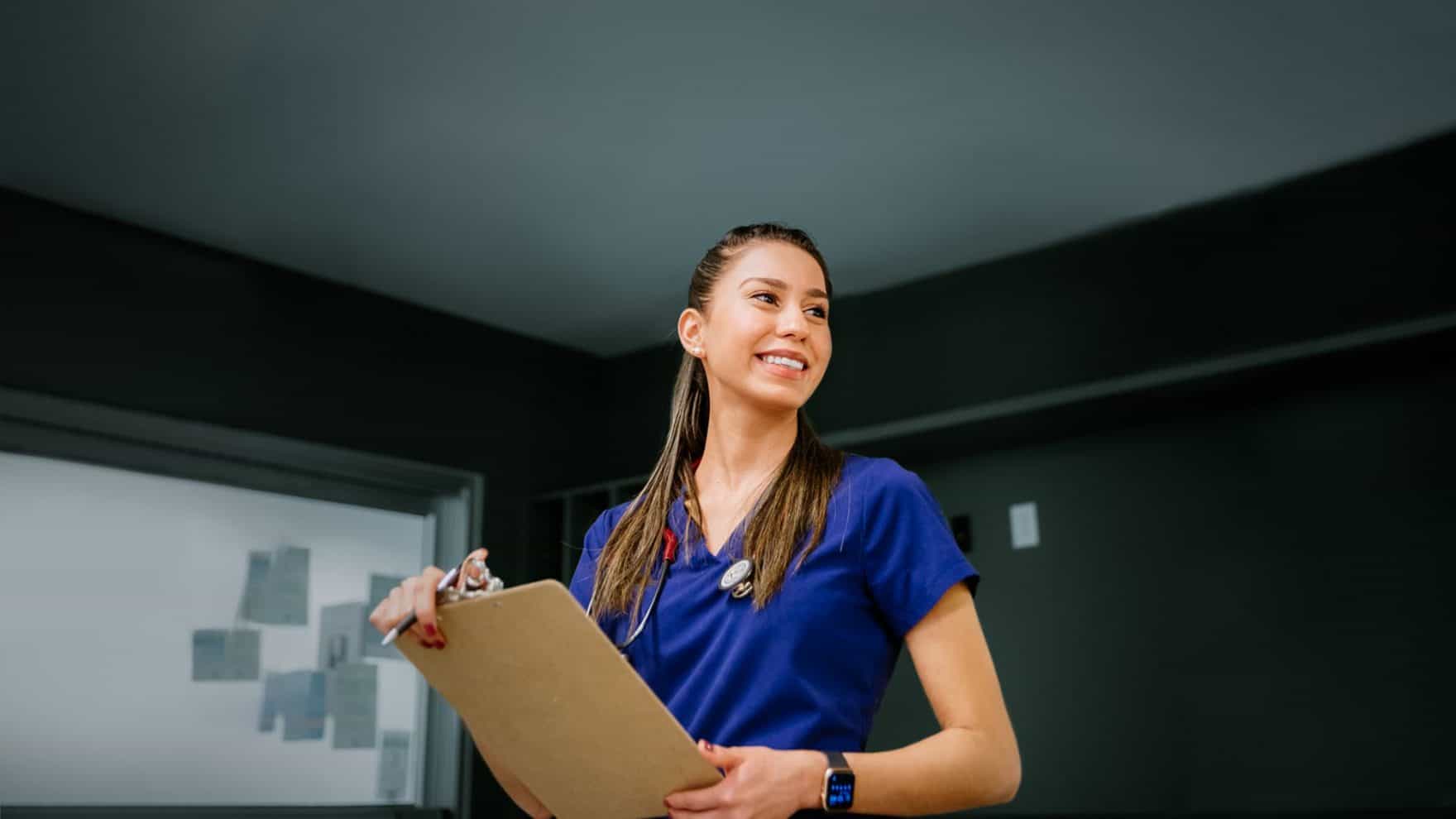 A nurse with a clipboard: Explore the Healthcare Policy certificate program offered by Regent University.