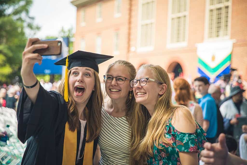 A Regent University graduate celebrates the moment.