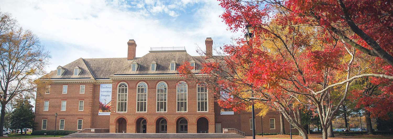 The library building and fall colors at Regent University's beautiful campus in Virginia Beach, VA 23464.
