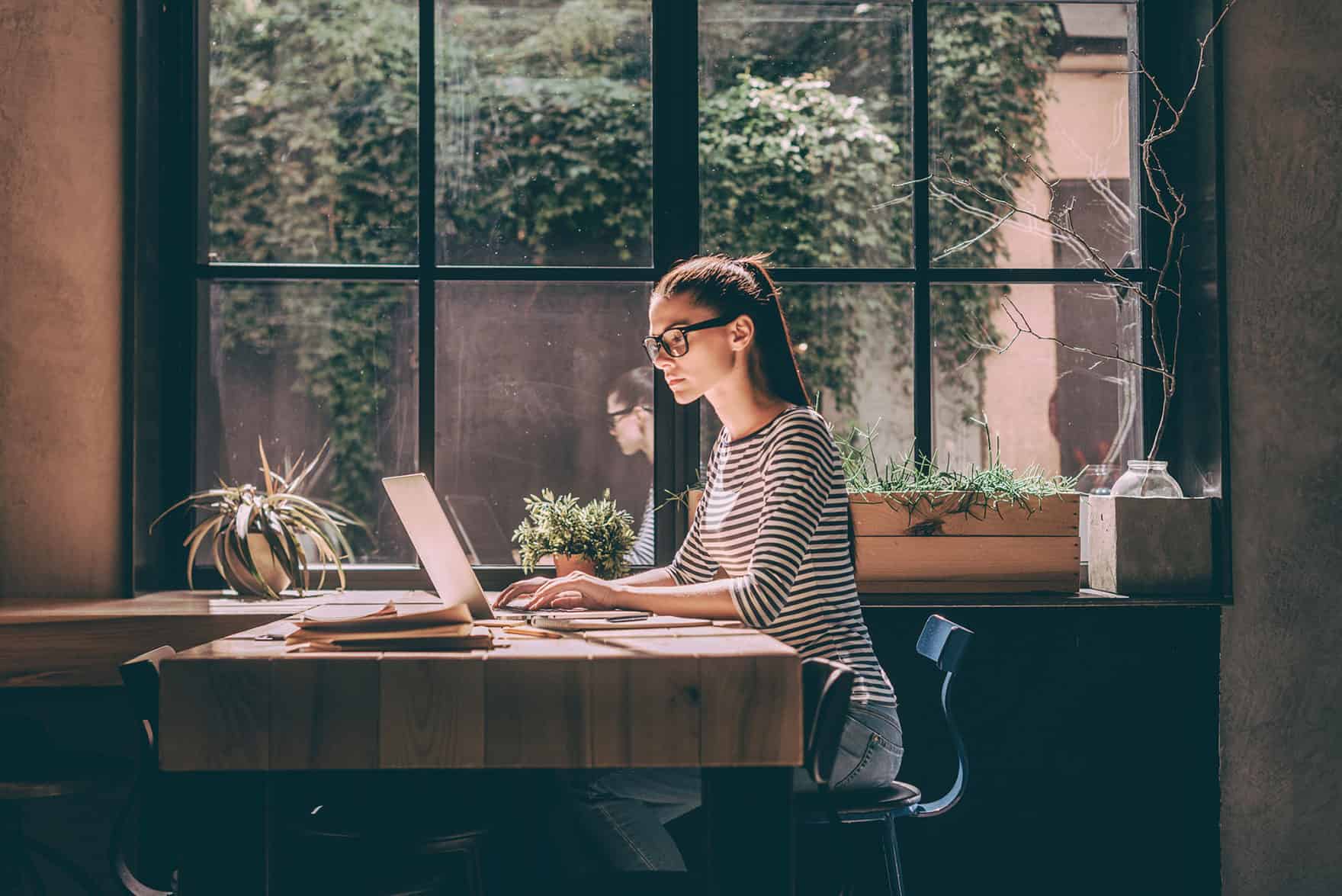 A girl working on her laptop.