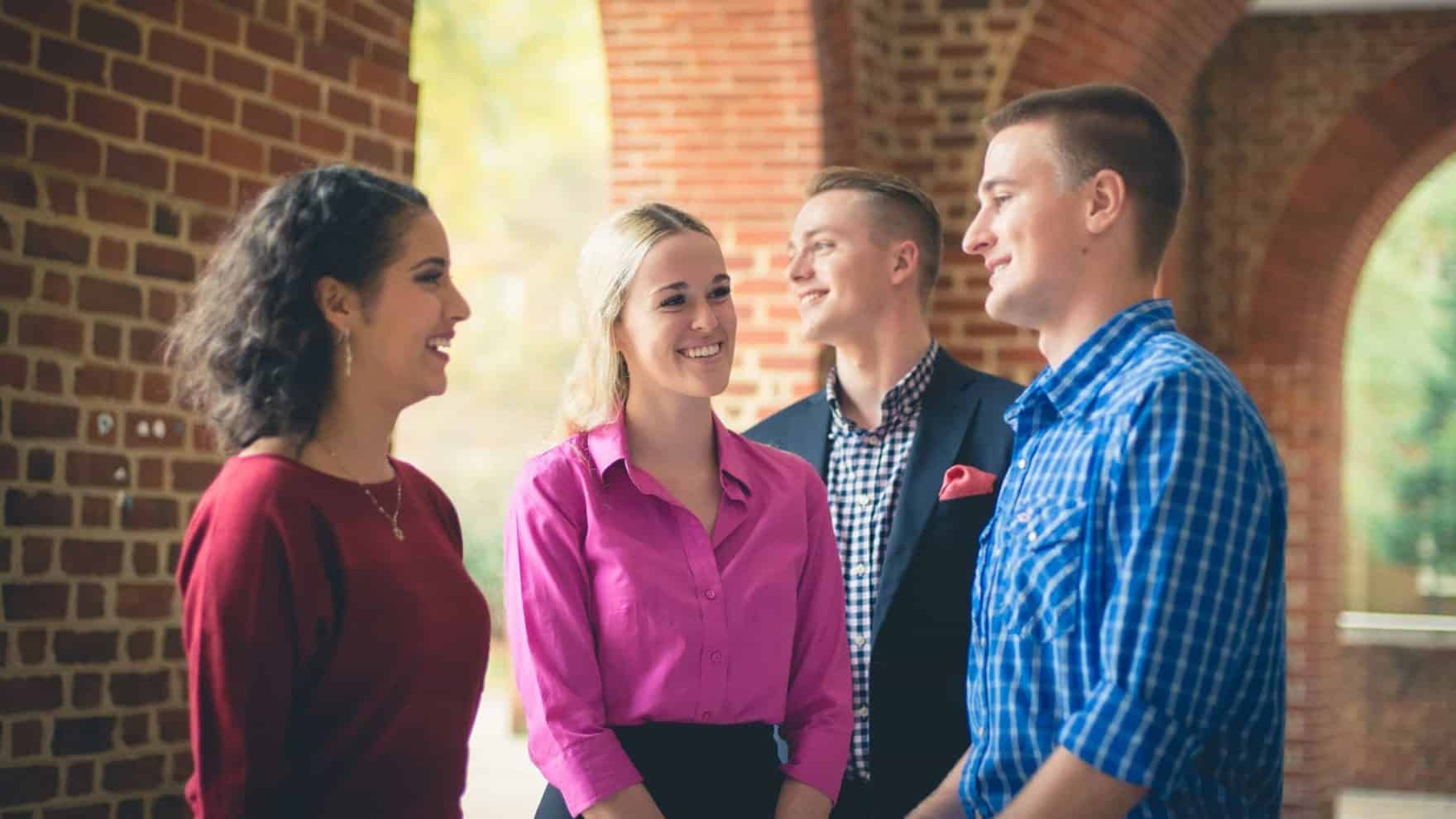 Students interact at Regent University, which offers psychology and counseling degree programs.