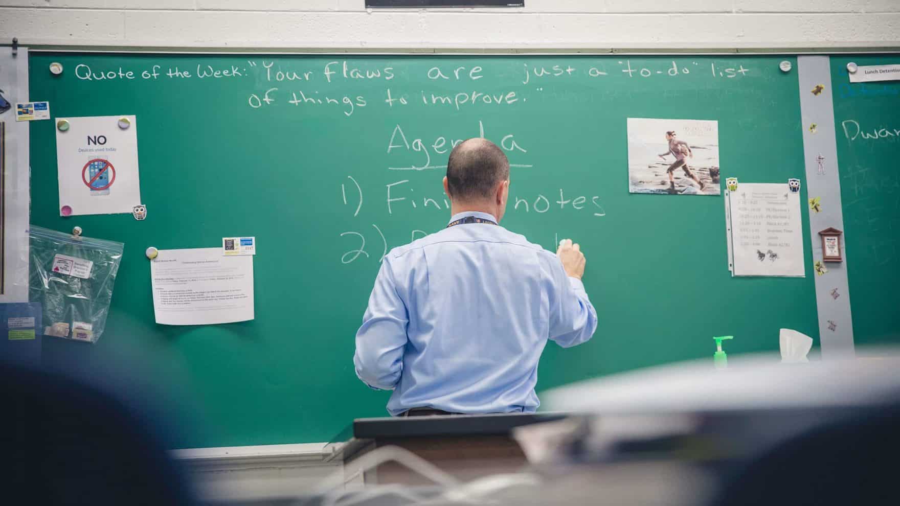 A Regent alumnus teaches in his classroom: Learn how to become a teacher.