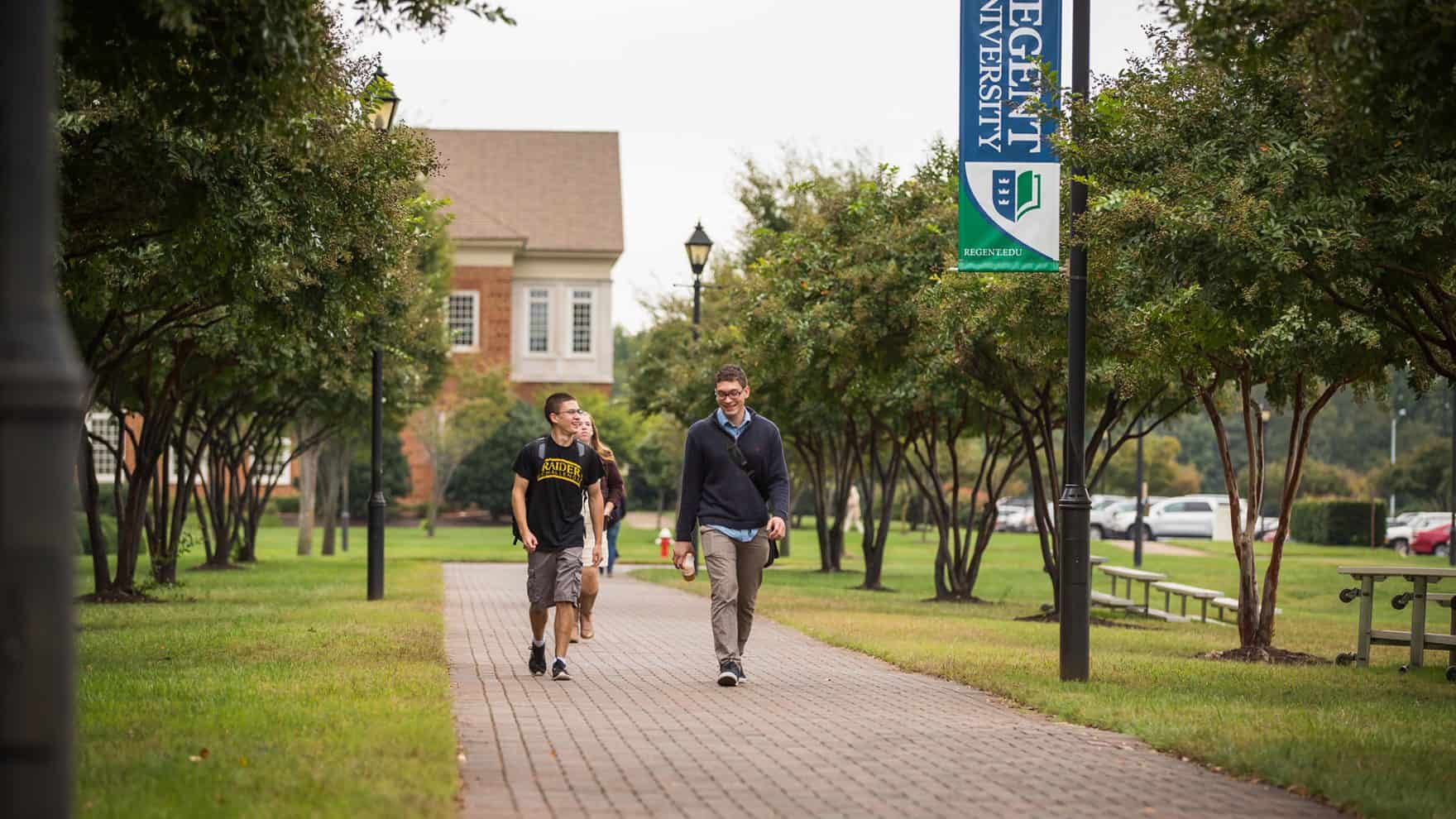 Students walk through Regent University, a Christian college in Virginia Beach.