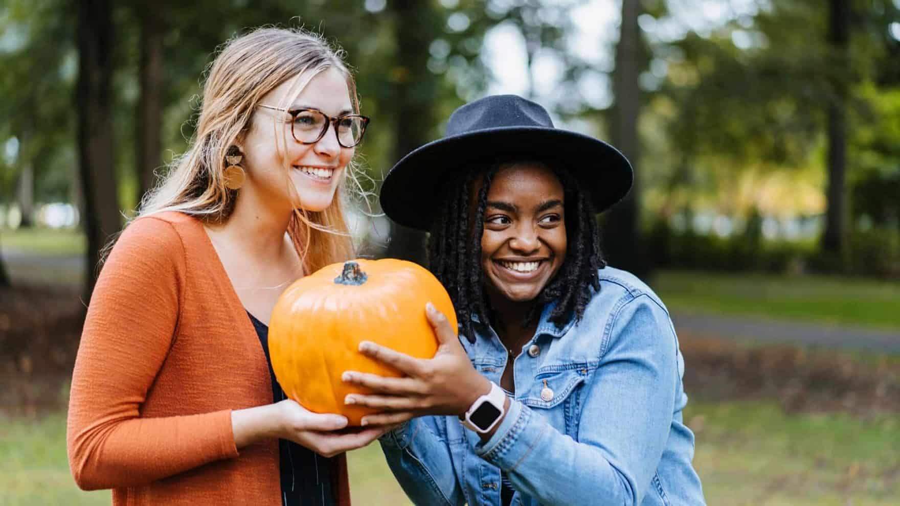 Staff enjoying the beautiful Fall campus at Regent University a Christian university in Virginia Beach, Virginia.