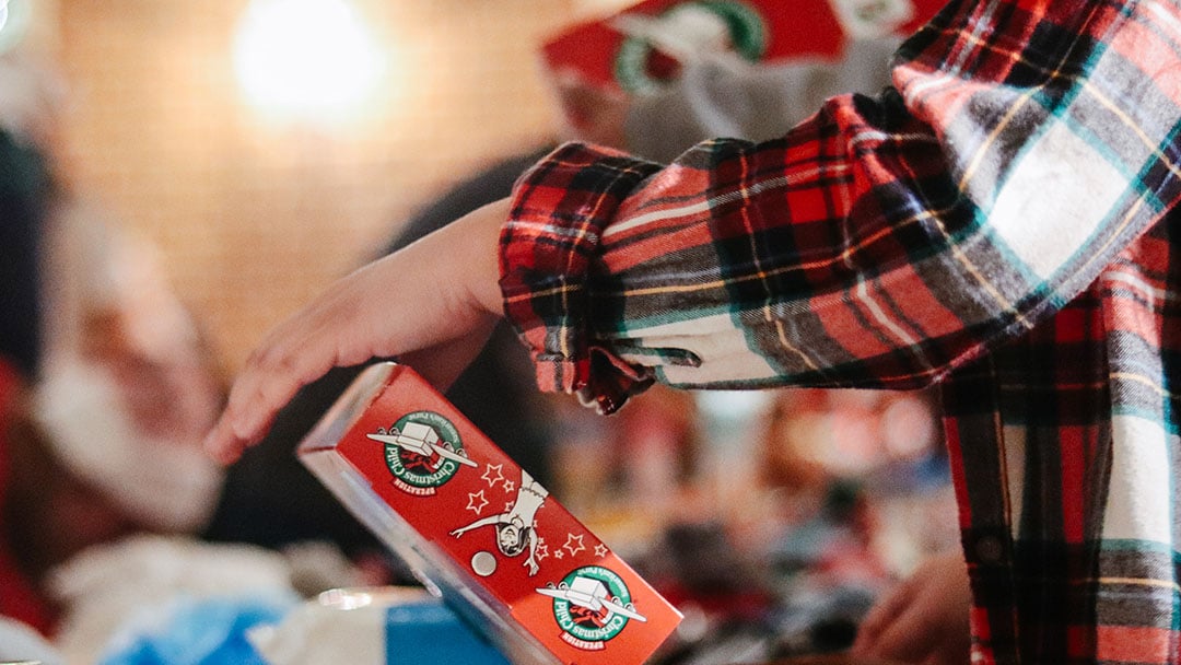 An Operation Christmas Child box being prepped.