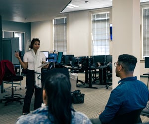 Students take a class in the Cyber Range at Regent University.