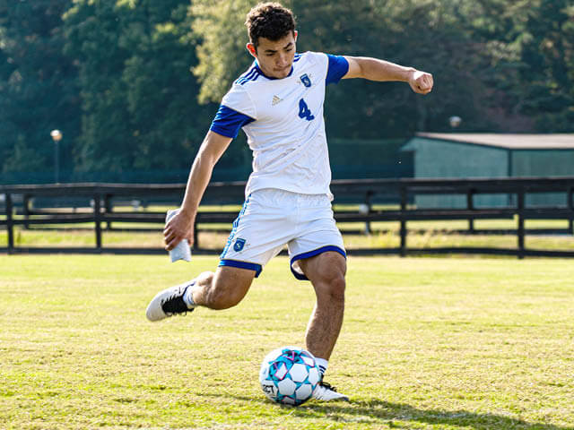 A soccer player at Regent, a college that offers academic advising to college students.
