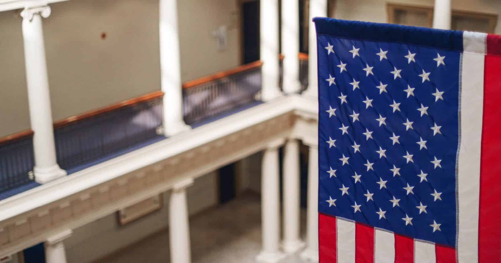 An American flag is hanging in Robertson Hall. Learn more about military friendly colleges.