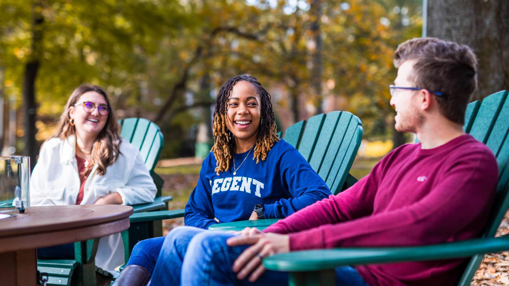 Students interact outside Regent University's chapel in Virginia Beach, VA 23464: Explore Regent's student resources for on-campus and online students.