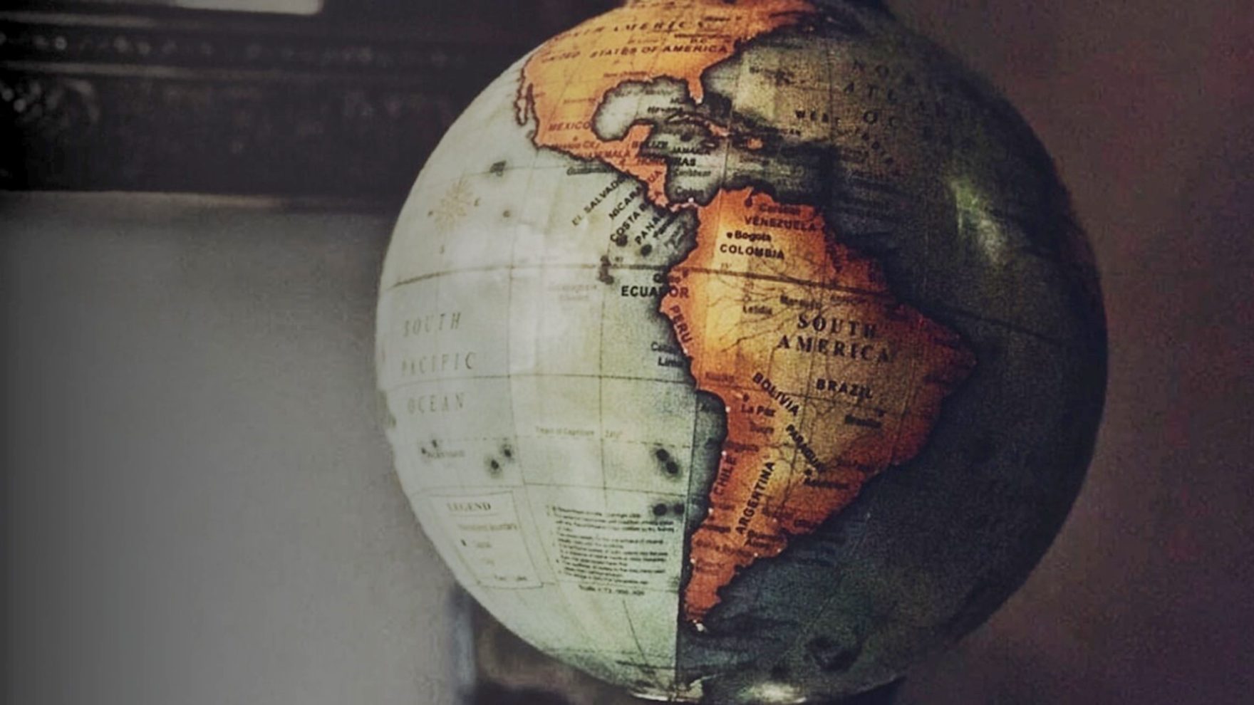 A closeup view of a globe displaying South America in the office of a Regent University professor in Virginia Beach.