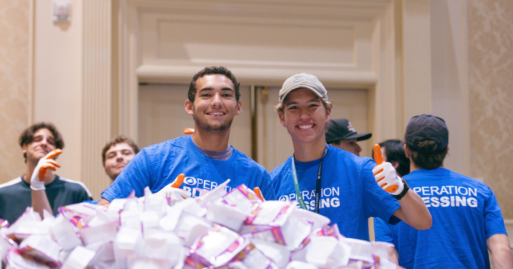 Regent Freshmen Pack 57,000 Meals for Disaster Relief