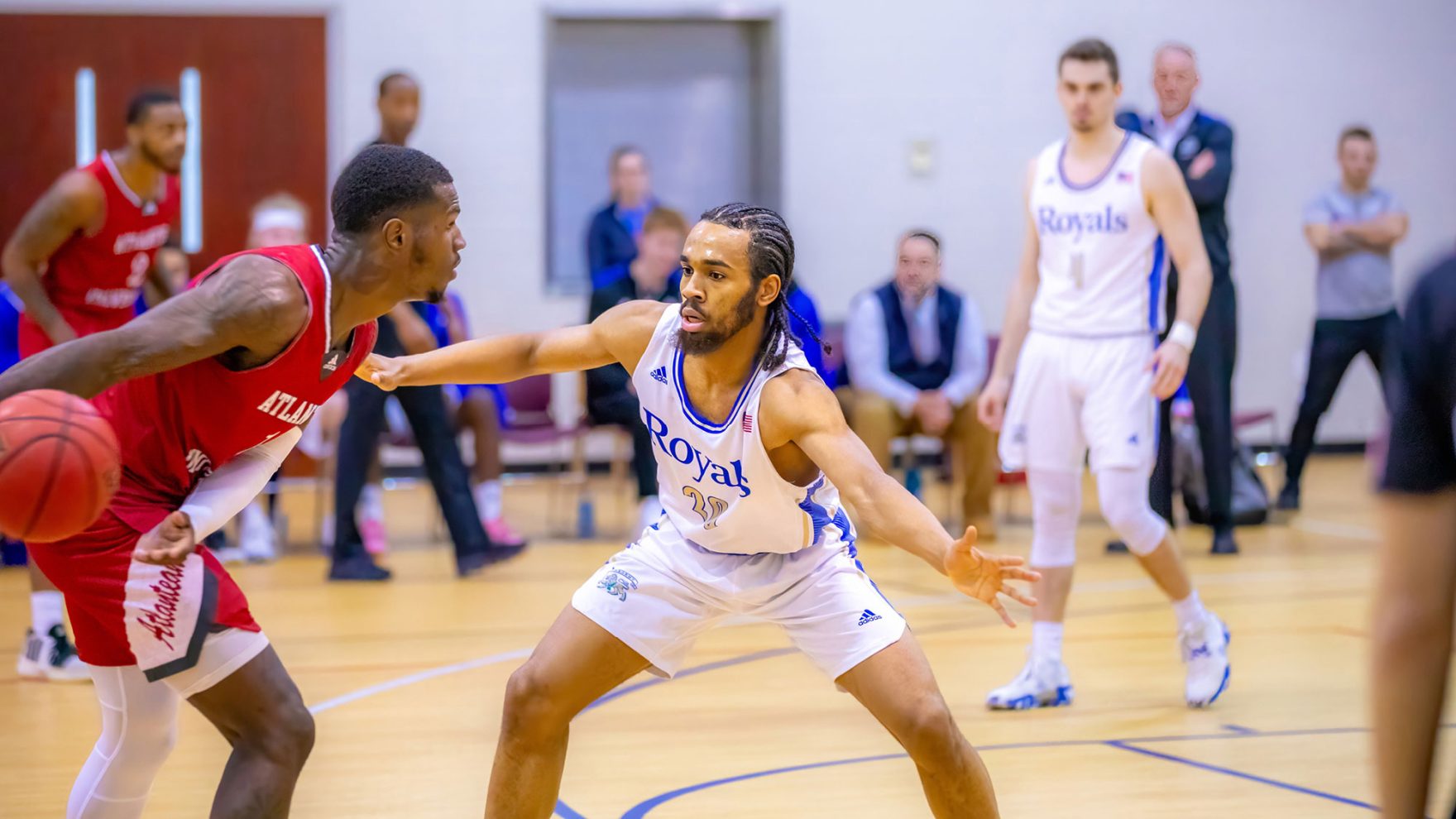 Regent University athletes of NCCAA athletics competing in basketball for the Regent Royals.