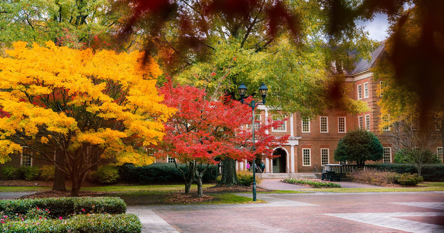 Regent university Robertson hall building during fall.