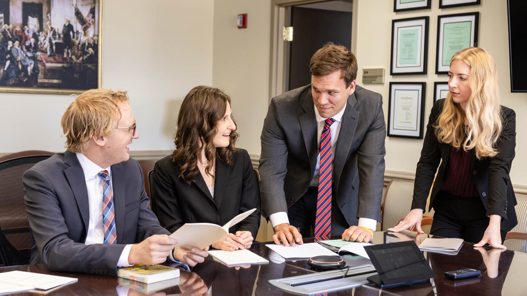 law professionals working on a case.