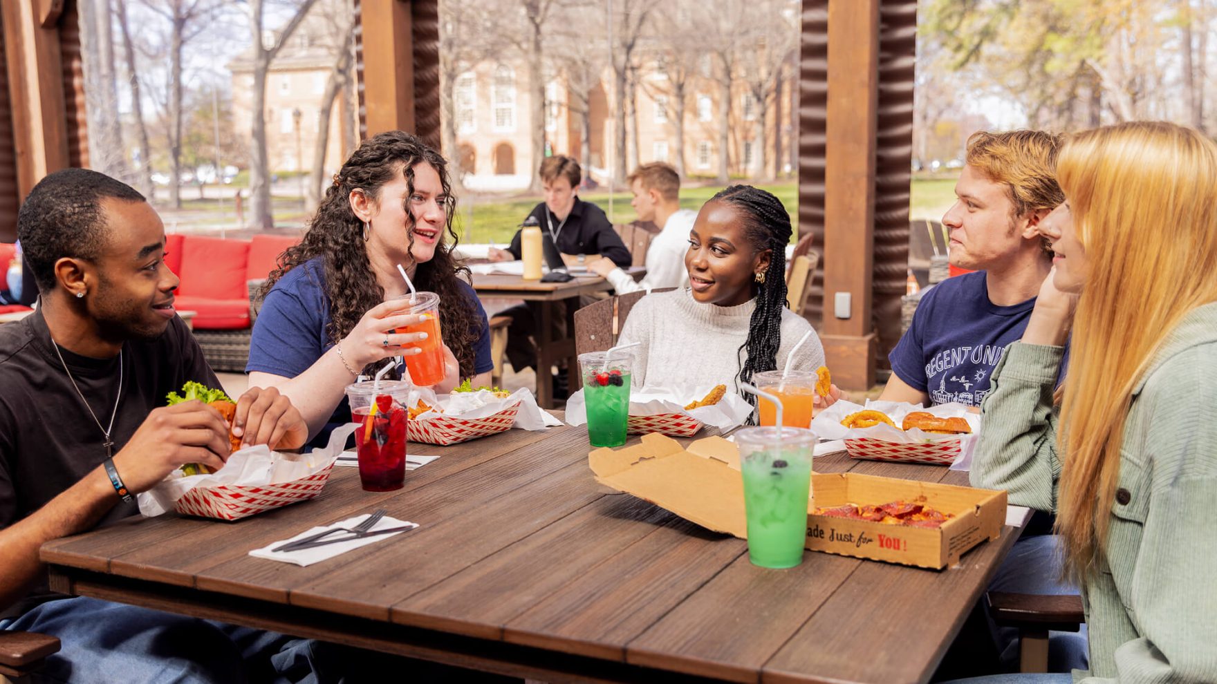 Students eating and using the college meal plan at The Ordinary Cafe on Regent's campus in VA Beach
