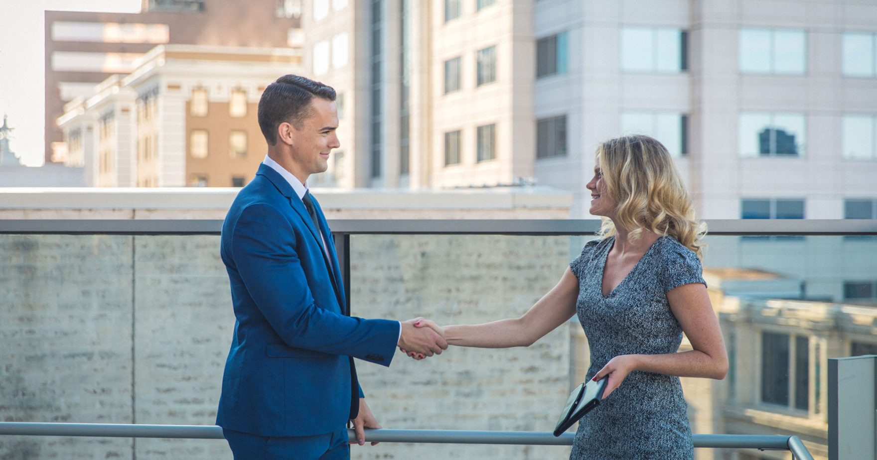 Business professional shaking hands
