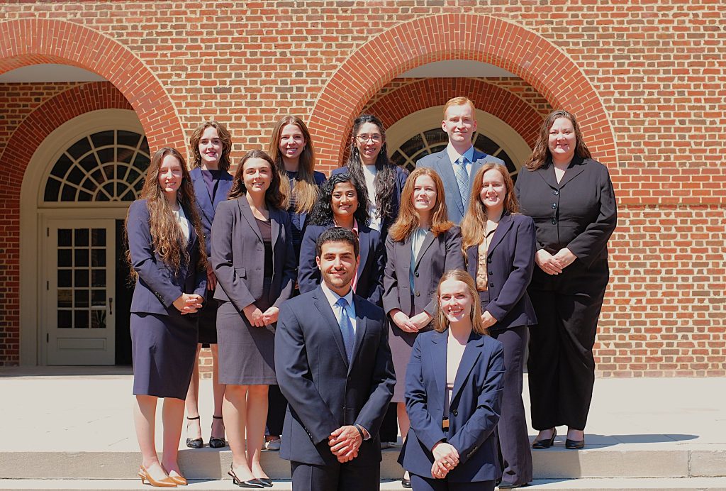 Regent University School of Law Executive board members standing on the steps outside Robertson Hall.