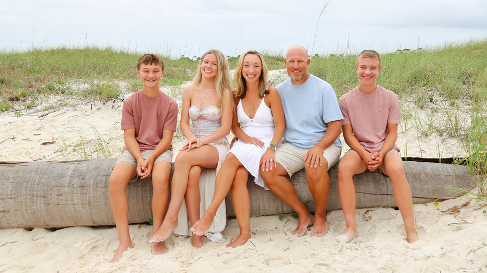Dr. Amanda-Lee Pitzer with family, a Regent University School of Education professor and alumna