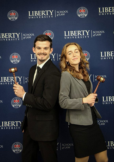 Moot Court team group photo outdoors in autumn