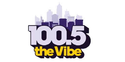 100.5 The Vibe radio station logo with city skyline
