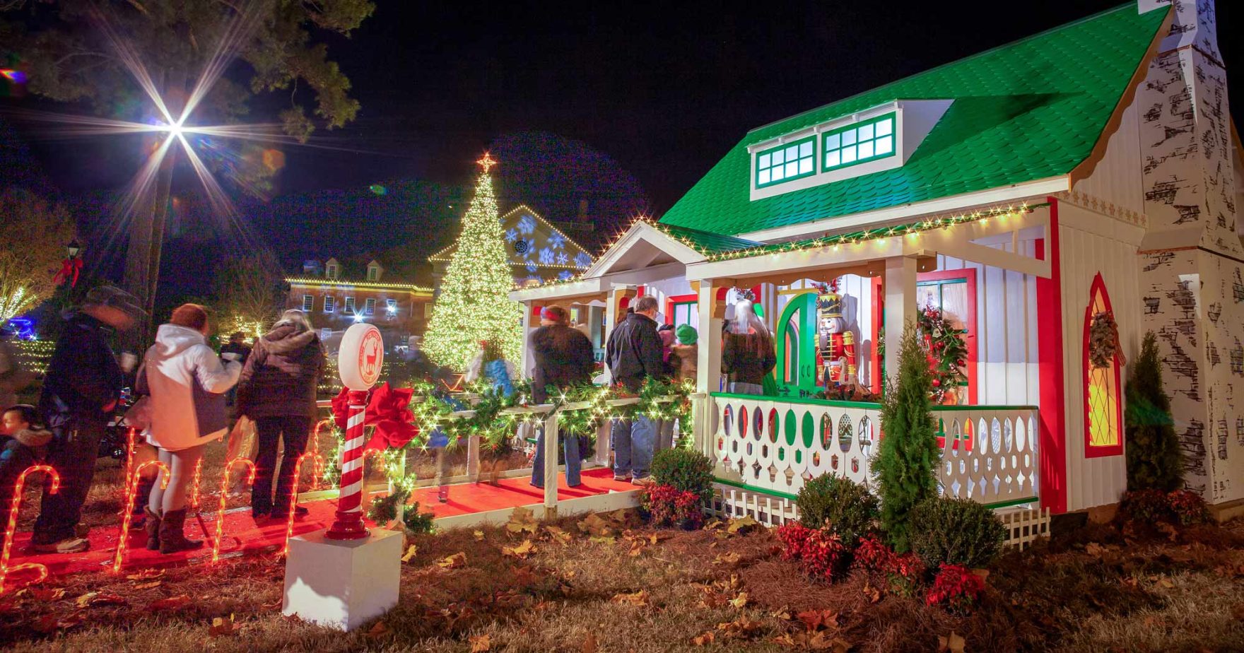 Families lining up to visit Santa Claus at the Christmas Village at Regent University in Virginia Beach, Virginia.