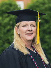Rebekah Lloyd, Regent University College of Arts and Sciences psychology graduate in cap and gown