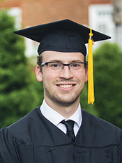 Sam Morgan, Regent University College of Arts and Sciences mathematics graduate in cap and gown
