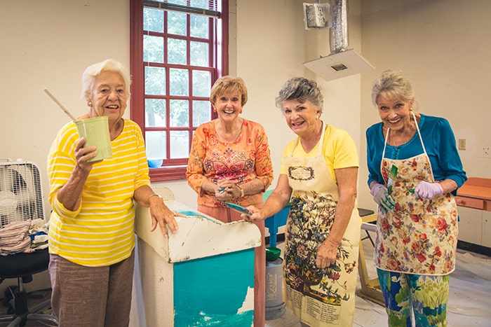 Dede Robertson and friends doing art project together