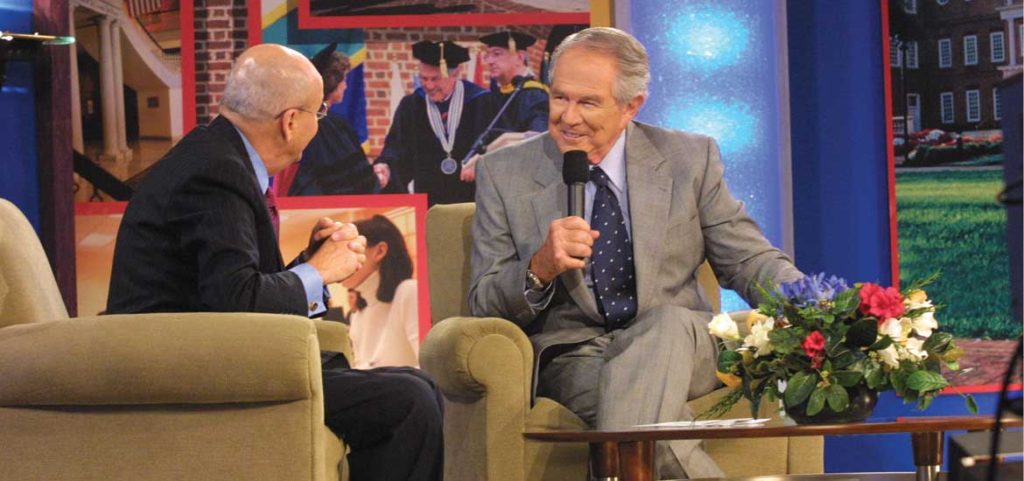 Dr. M.G. "Pat" Robertson hosting The 700 Club.