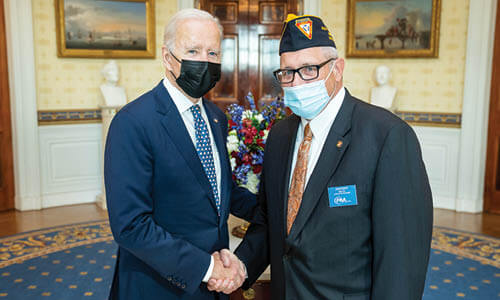 John Davis '05 pictured with President Joe Biden